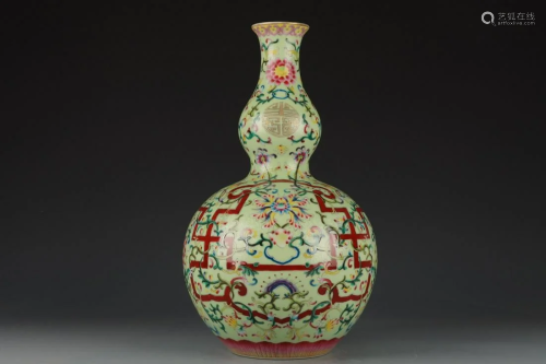 CHINESE GREEN GROUND FAMILLE ROSE GOURD VASE