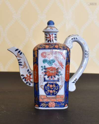 A CHINESE JAPAN PATTERNED TEAPOT AND COVER. 7.5ins high.