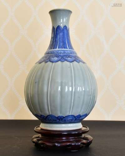 A CHINESE CELADON AND BLUE BULBOUS VASE. 12ins high.