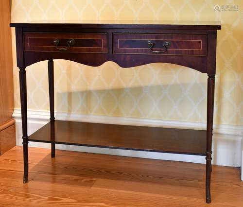 A REPRODUCTION MAHOGANY NARROW SIDE TABLE with two frieze dr...