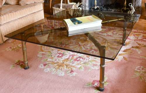 A MODERN SMOKED GLASS COFFEE TABLE. 3ft 0ins square.