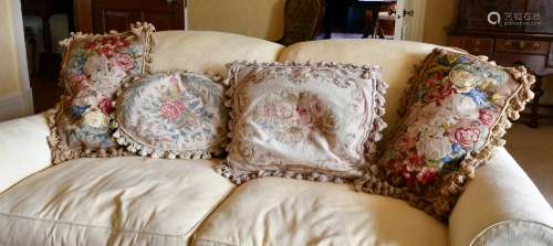 FOUR VARIOUS TAPESTRY COVERED CUSHIONS.