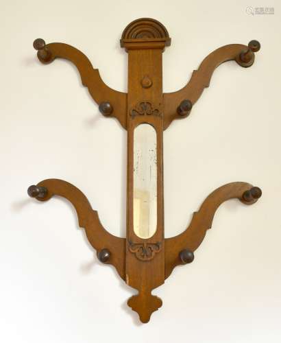 A VICTORIAN MAHOGANY TWO ARM HAT STAND with mirrored back.