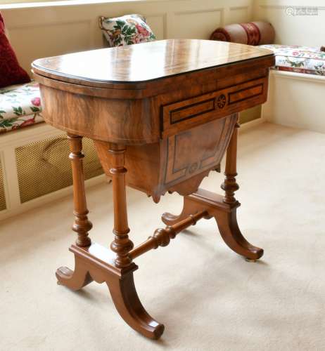 A GOOD VICTORIAN WALNUT GAMES AND SEWING STAND, the folding ...