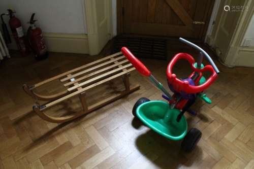 A CHILD'S SLEDGE AND TRACTOR (2).