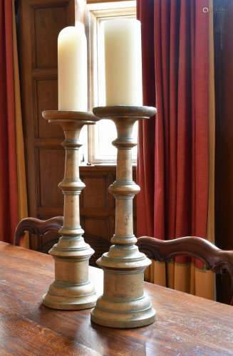 A PAIR OF TURNED WOOD CANDLESTICKS, possibly Italian.1ft 6in...