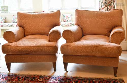 A GOOD PAIR OF LARGE DEEP EASY ARMCHAIRS on tapering legs wi...