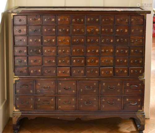 A CHINESE NARROW CABINET with SIXTY-TWO DRAWERS. 3ft 9ins lo...