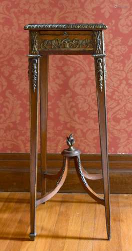 A 19TH CENTURY FRENCH SQUARE MARBLE TOP STAND on tapering le...