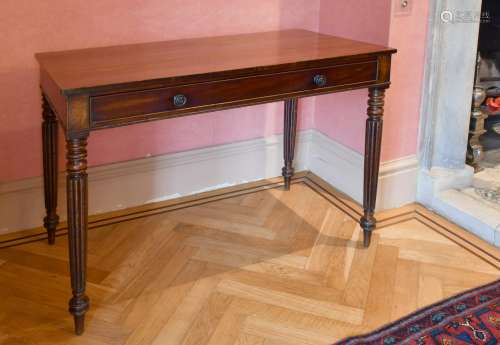 A LATE REGENCY MAHOGANY PLAIN SIDE TABLE with frieze drawer,...