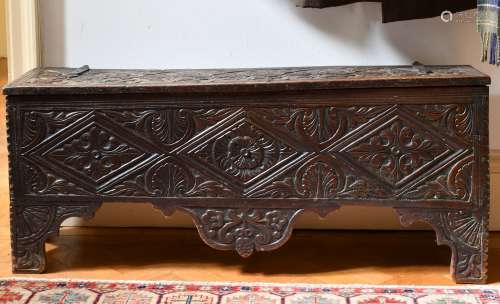 A 17TH CENTURY CARVED OAK SWORD CHEST. 3ft 9ins long x 1ft w...