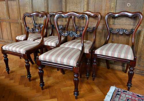 A SET OF SIX VICTORIAN ROSEWOOD SINGLE CHAIRS with shaped ba...