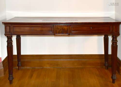 A REGENCY MAHOGANY LONG SIDE TABLE with plain top, two friez...