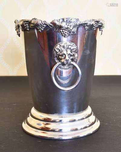 A SILVER PLATE TAPERING ICE BUCKET with lion ring handle.