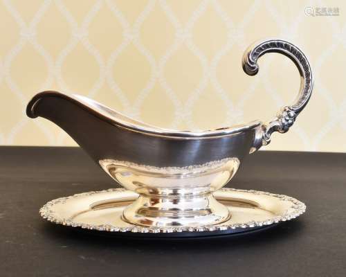 A PLATED OVAL SAUCE TUREEN WITH STAND.