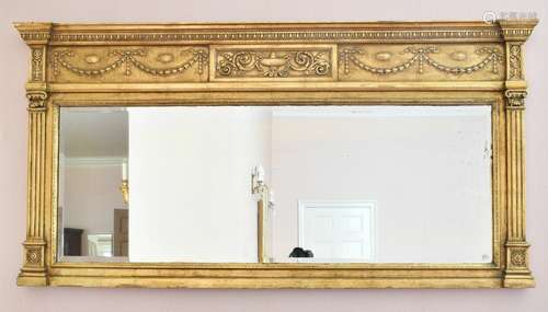 A GILTWOOD LONG OVERMANTLE MIRROR with urn and ribbon motifs...