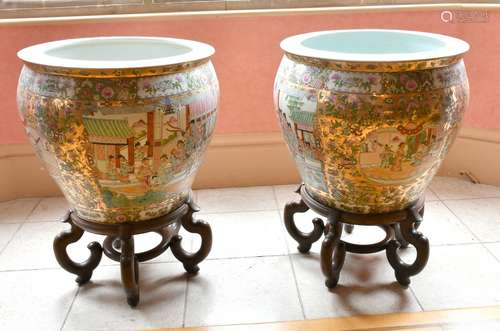 A LARGE PAIR OF CANTON PORCELAIN FISH TANKS on wooden stands...