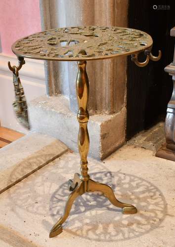 A BRASS TRIVET.