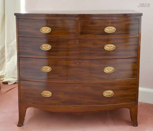 A GEORGIAN MAHOGANY BOWFRONT CHEST of two short and three lo...