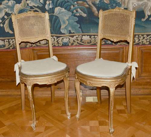 TWO GILT CANE SEATED CHAIRS.