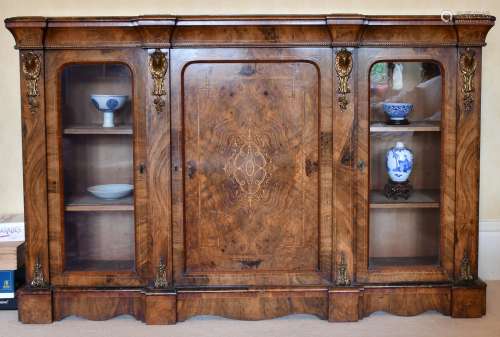 A GOOD VICTORIAN FIGURED WALNUT CREDENZA, the front with cen...