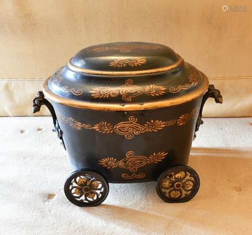 A VICTORIAN OVAL PONTYPOOL COAL BOX AND COVER on four wheels...