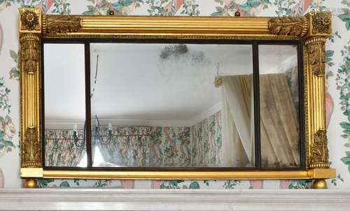 A LATE REGENCY GILTWOOD OVERMANTLE MIRROR with three mirrore...