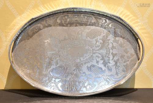 AN OVAL ENGRAVED PLATE TWO-HANDLED TEA TRAY.