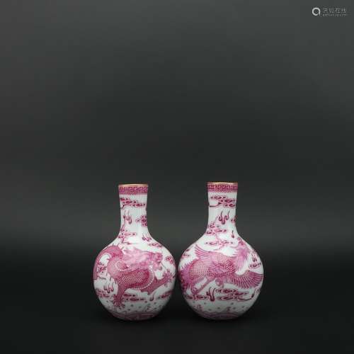 A Pair of Carmine Globular Vases