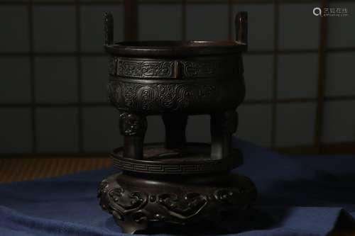 Qing dynasty, zi tan wood carved double ear tripod censer