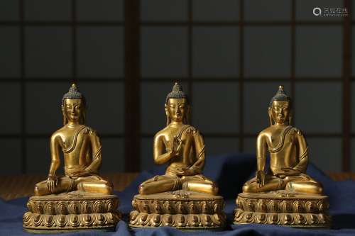 Three Gilt bronze statue of  buddha