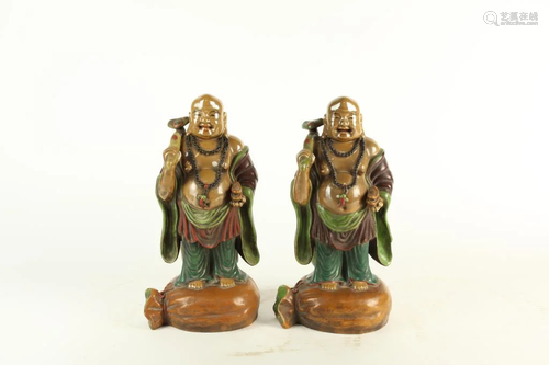 PAIR OF HAPPY BUDDHAS BEARING AUSPICIOUS SYMBOLS