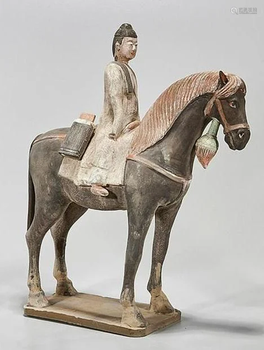 CHINESE POTTERY FIGURE OF A EQUESTRIAN