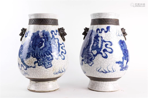 PAIR OF BLUE AND WHITE OX VASES