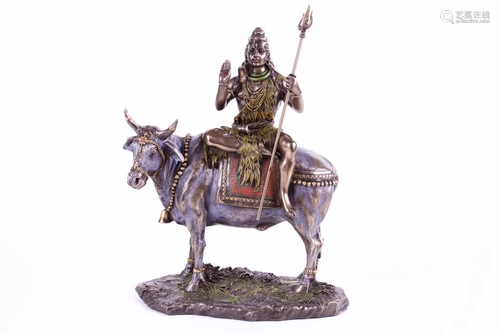 CARVED BRONZE STATUE OF SHIVA RIDING ON A BULL