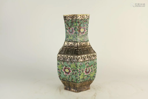 MULTI-PANELED VASE WITH FLORAL DESIGN