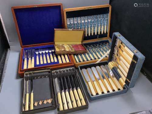 Assorted cased sets of plated flatware and cutlery including...