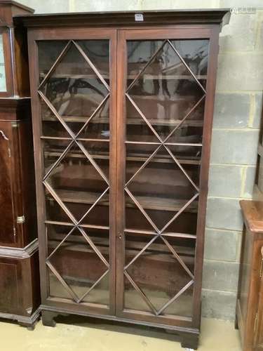 A George III mahogany bookcase with two astragal glazed door...