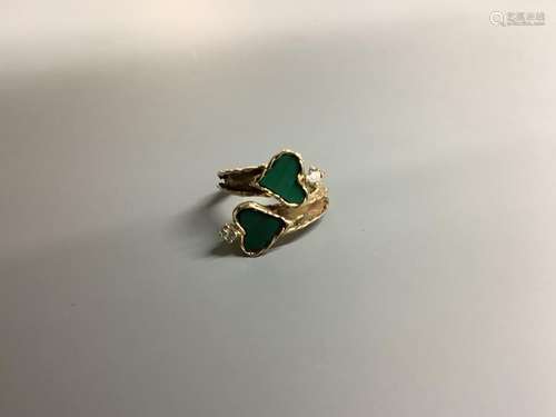 A modern yellow metal, two stone heart shaped malachite and ...