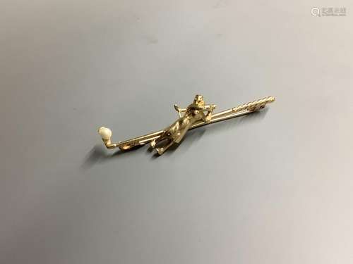 A modern 9ct gold and seed pearl set bar brooch, modelled as...