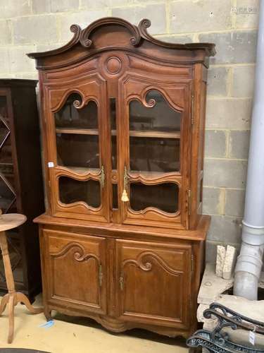 A 19th century French stained pine vitrine, with two glazed ...