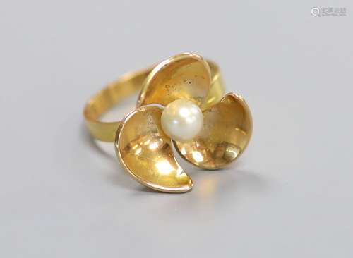 A modern 750 yellow metal and cultured pearl set dress ring,...