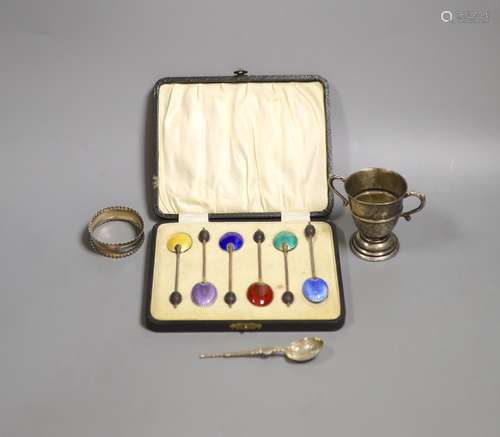 A cased set of six silver and enamel(a.f.) bean end coffee s...