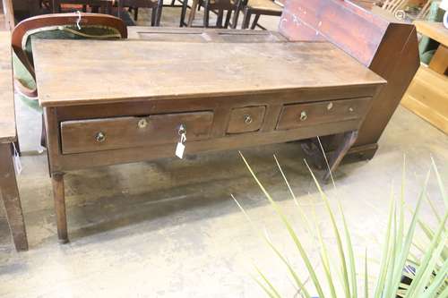 An early 18th century oak low dresser, length 165cm, depth 5...