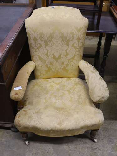 A Victorian upholstered open armchair, width 70cm, depth 76c...