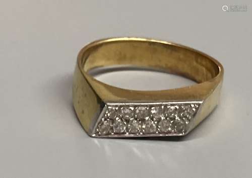 A modern 18k yellow metal and pave set two row diamond ring,...