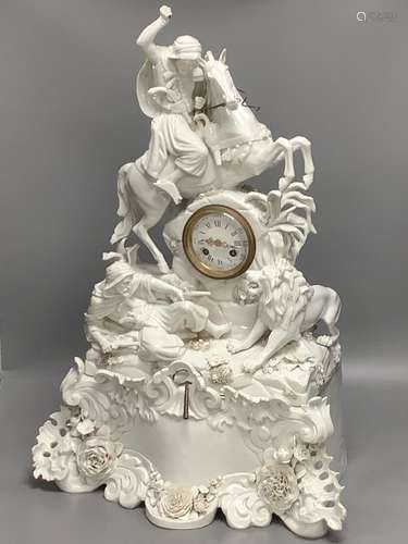 A 19th century German porcelain mantel clock modelled as a l...