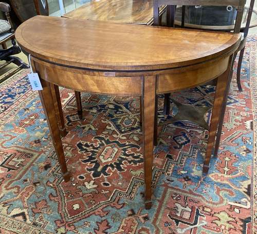 A George III satinwood demi lune folding card table, width 9...