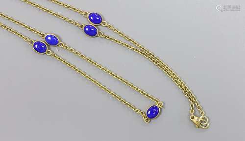 A modern 9ct gold and seven stone cabochon lapis lazuli set ...