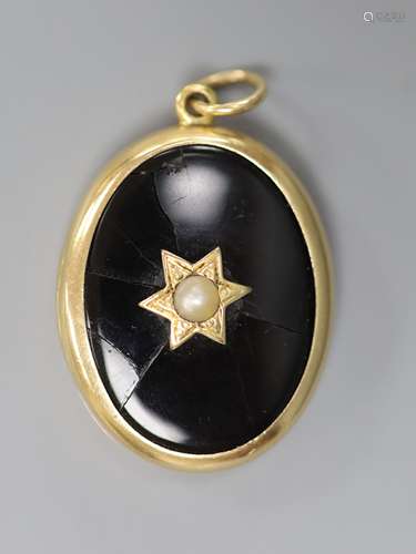 A Victorian Dublin oval yellow metal black enamel and split ...